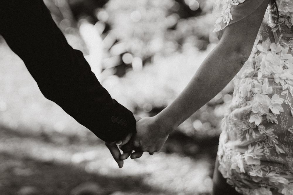 Couple holding hands